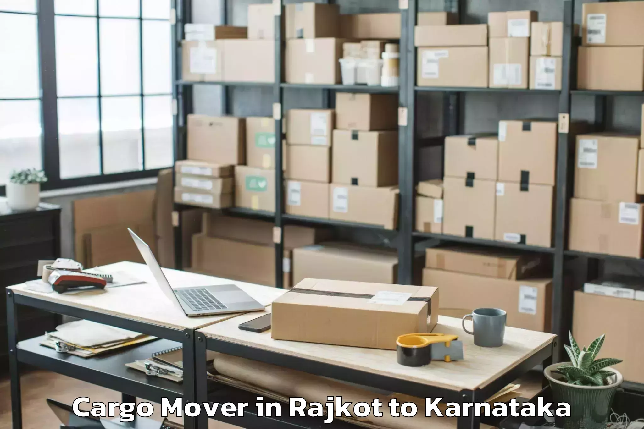 Top Rajkot to Karnataka Janapada Vishwavidya Cargo Mover Available